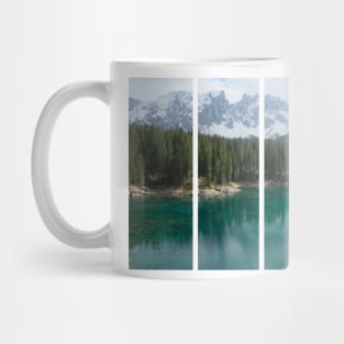 The fabulous alpine lake of Carezza in the Dolomites (Bolzano). Lovely place in the Italian Alps. Reflections in the water. View from the shore. Sunny spring day. Trentino Alto Adige Mug